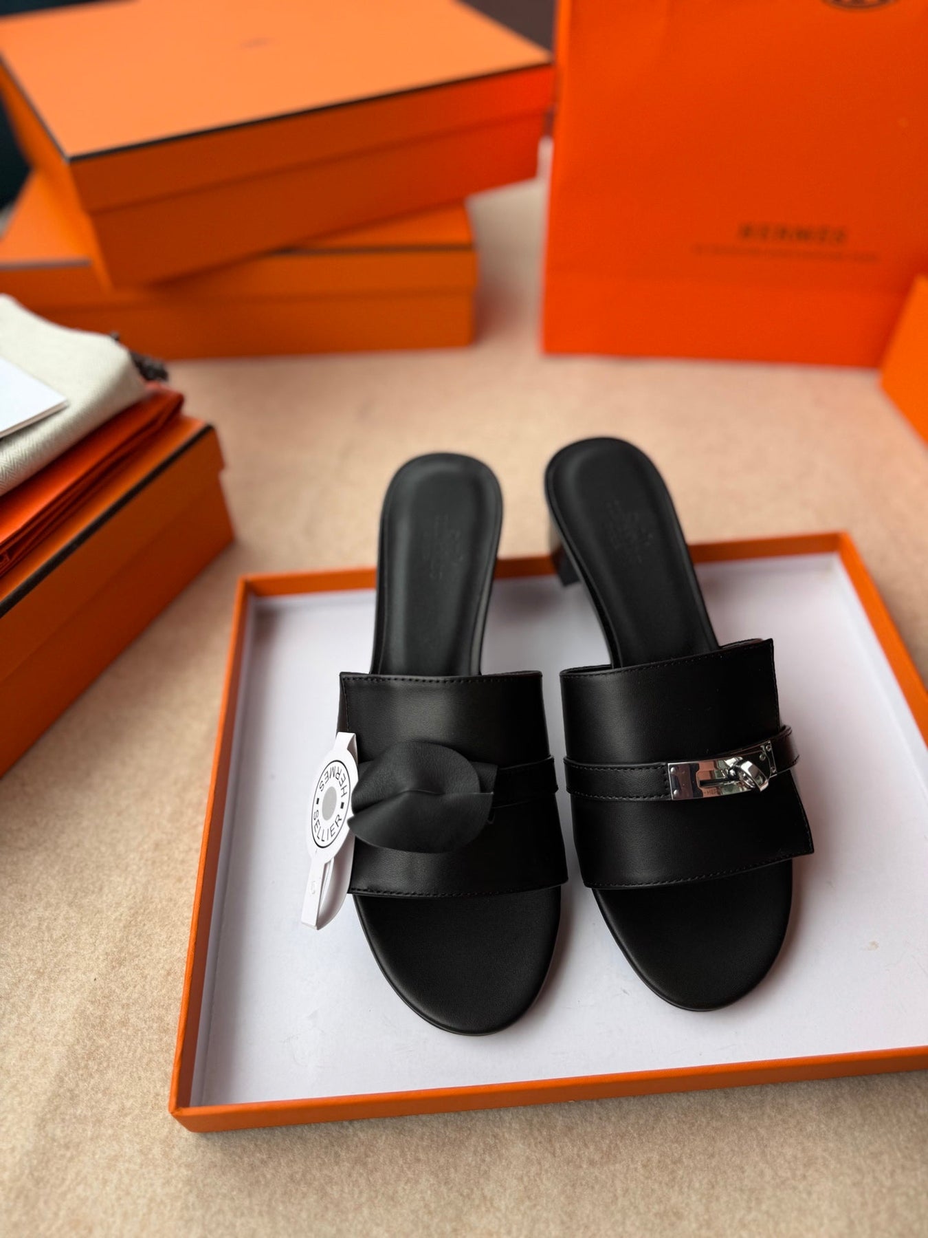 HIGH MULES IN BLACK CALFSKIN