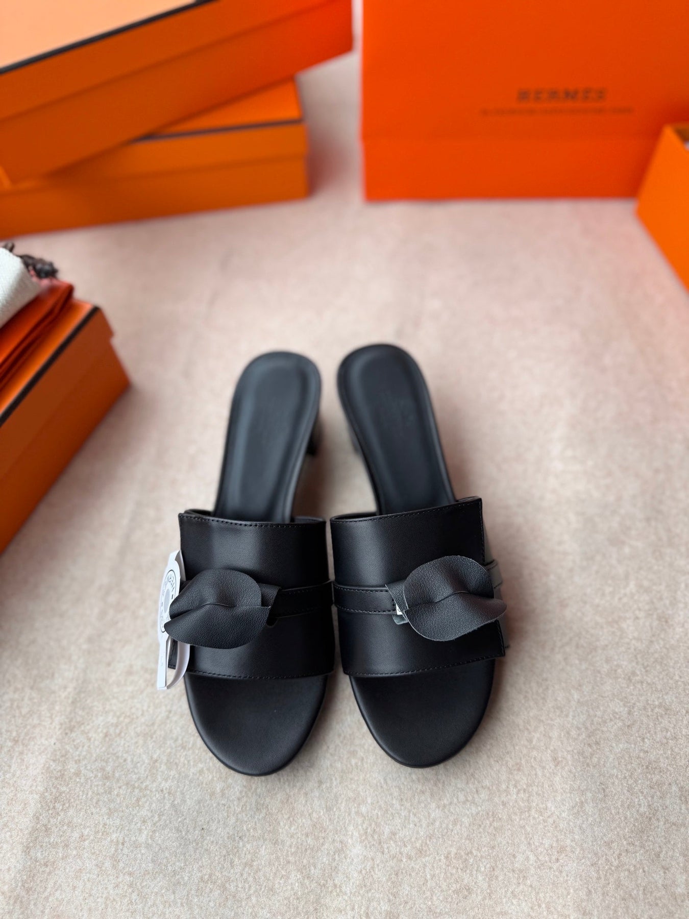 HIGH MULES IN BLACK CALFSKIN
