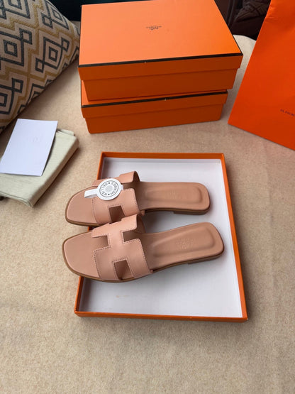 0RAN SANDALS IN PEACH PINK CALFSKIN