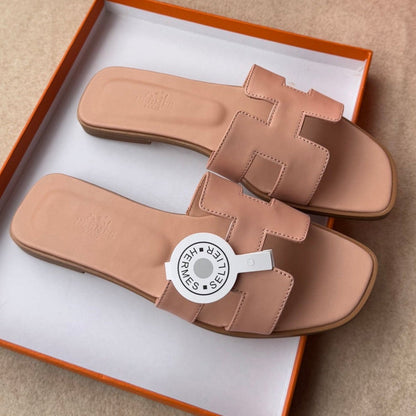0RAN SANDALS IN PEACH PINK CALFSKIN