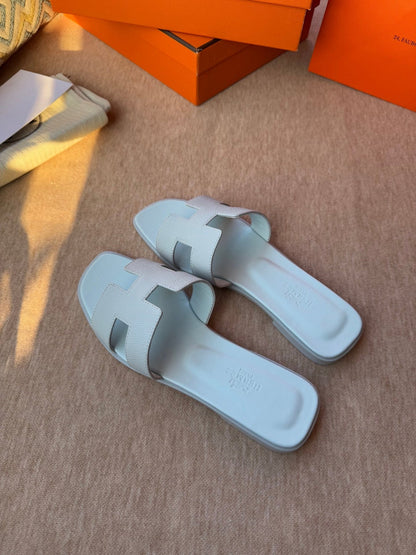 0RAN SANDALS IN ICE BLUE CALFSKIN