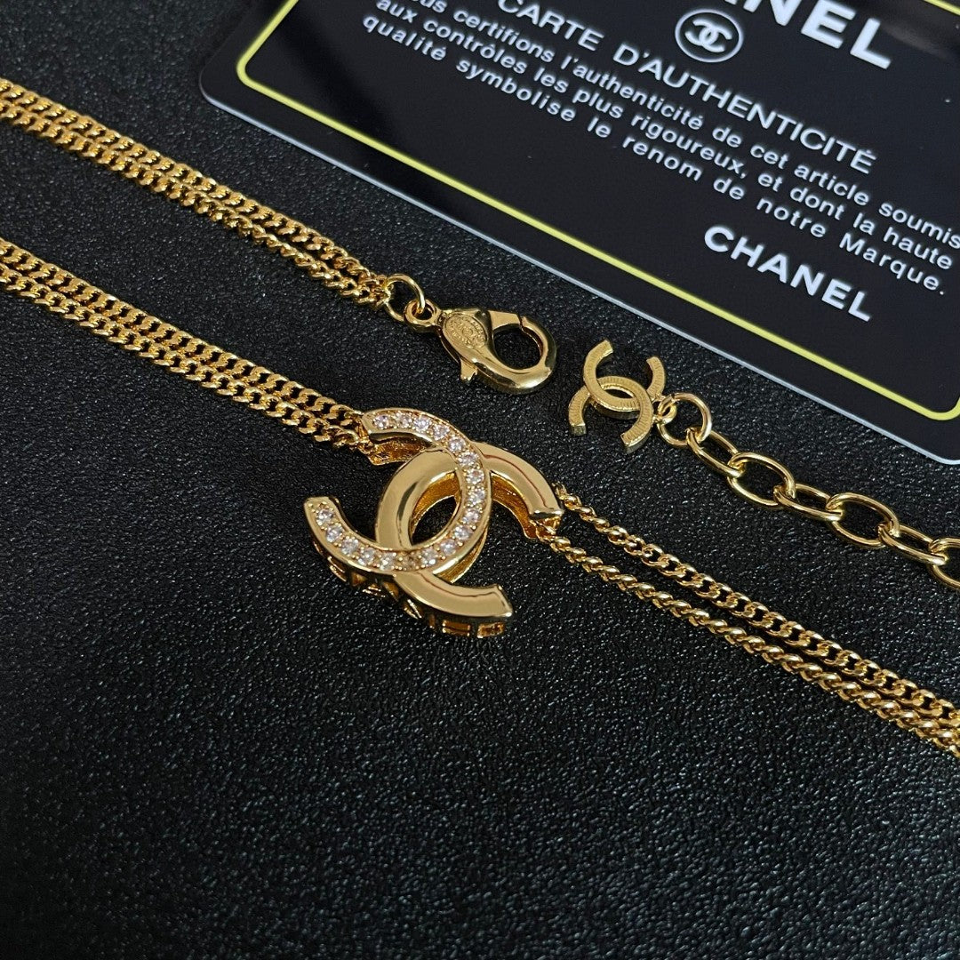 DOUBLE C HEART NECKLACE IN GOLD METAL