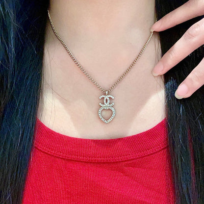 DOUBLE C HEART NECKLACE WITH CRYSTALS WHITE PEARLS AND SILVER METAL