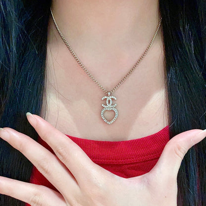 DOUBLE C HEART NECKLACE WITH CRYSTALS WHITE PEARLS AND SILVER METAL