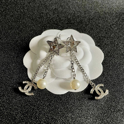 DOUBLE C STUD EARRINGS WITH STAR STONE DOUBLE CHAINS ONE WITH LOGO AND ONE WITH PEARL