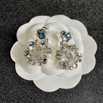 DOUBLE C STUD EARRINGS IN SILVER METAL WHITE PEARL GOLD AND BLUE STONES
