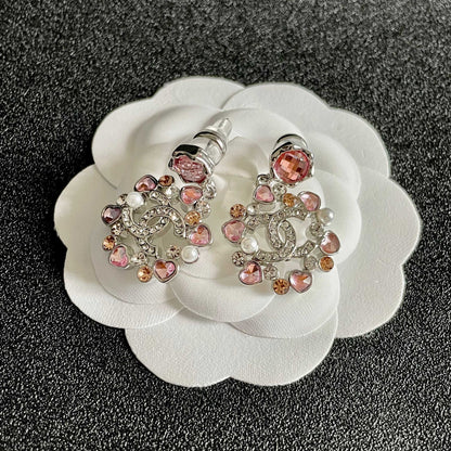 DOUBLE C STUD EARRINGS IN SILVER METAL WHITE & PINK STONES