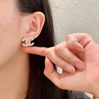 DOUBLE C STUD EARRINGS WITH WHITE TRIM AND CENTER STONE