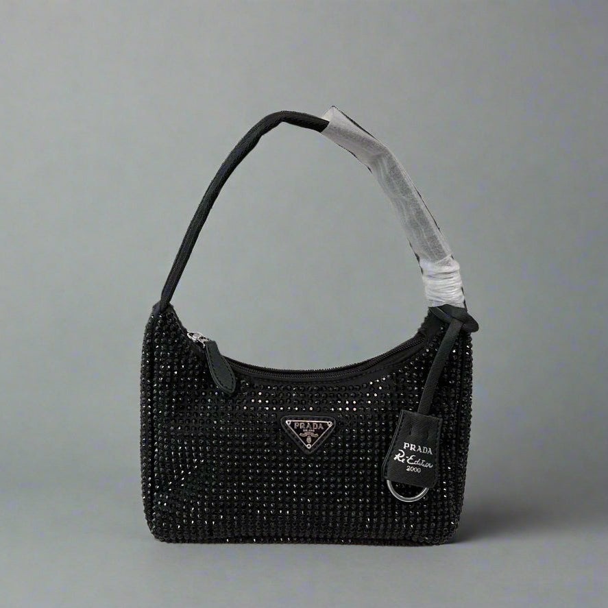 RE-EDITION HOBO SHOULDER BAG 21 IN BLACK STUDDED RE-NYLON