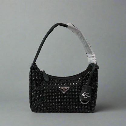 RE-EDITION HOBO SHOULDER BAG 21 IN BLACK STUDDED RE-NYLON