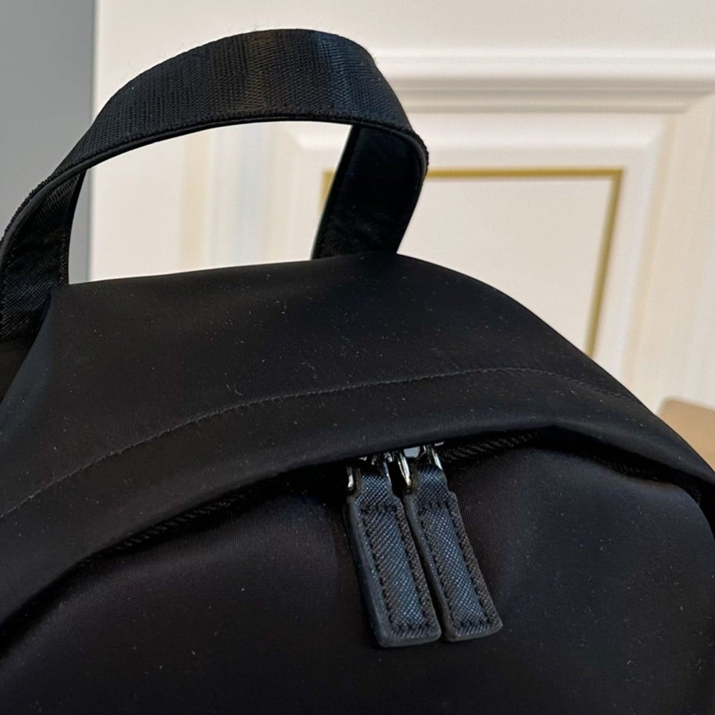 FRONT ZIP POCKET BACKPACK 35 IN BLACK RE-NYLON