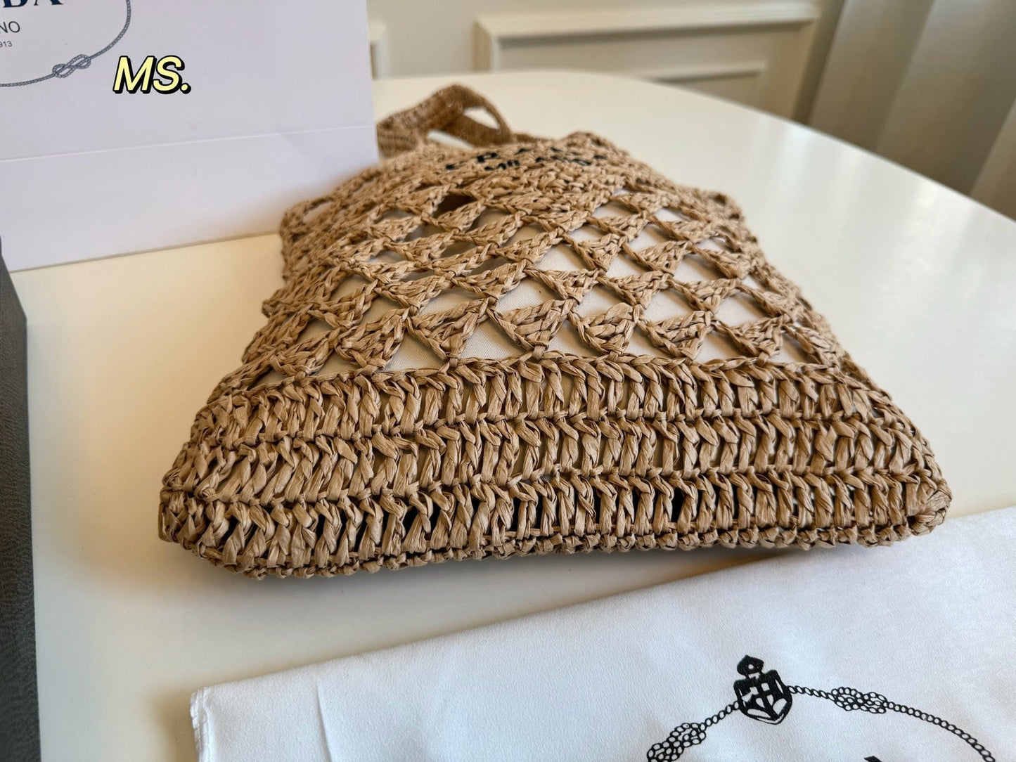 EMBROIDED LOGO TOTE BAG 32 IN BROWN WOVEN RAFFIA TRIANGLE PATTERN