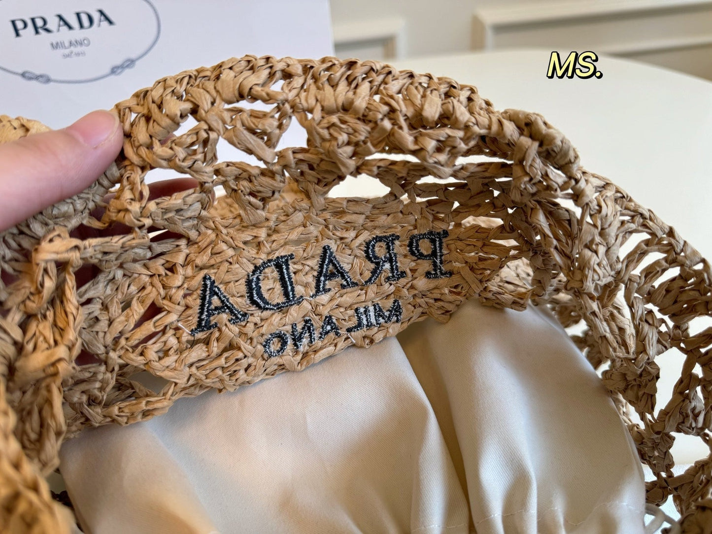 EMBROIDED LOGO TOTE BAG 32 IN BROWN WOVEN RAFFIA TRIANGLE PATTERN