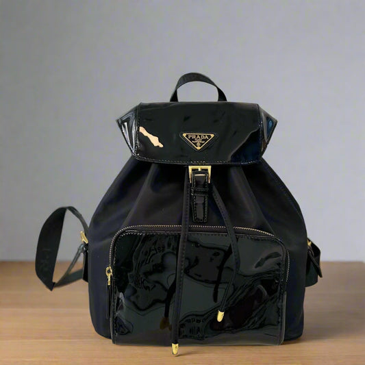 BACKPACK 30 IN BLACK RE-NYLON AND PATENT CALFSKIN GOLD HARDWARE