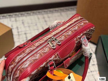 SAINT MARTIN BAG 35 IN BURGUNDY RED GOYARDINE CANVAS AND CALFSKIN
