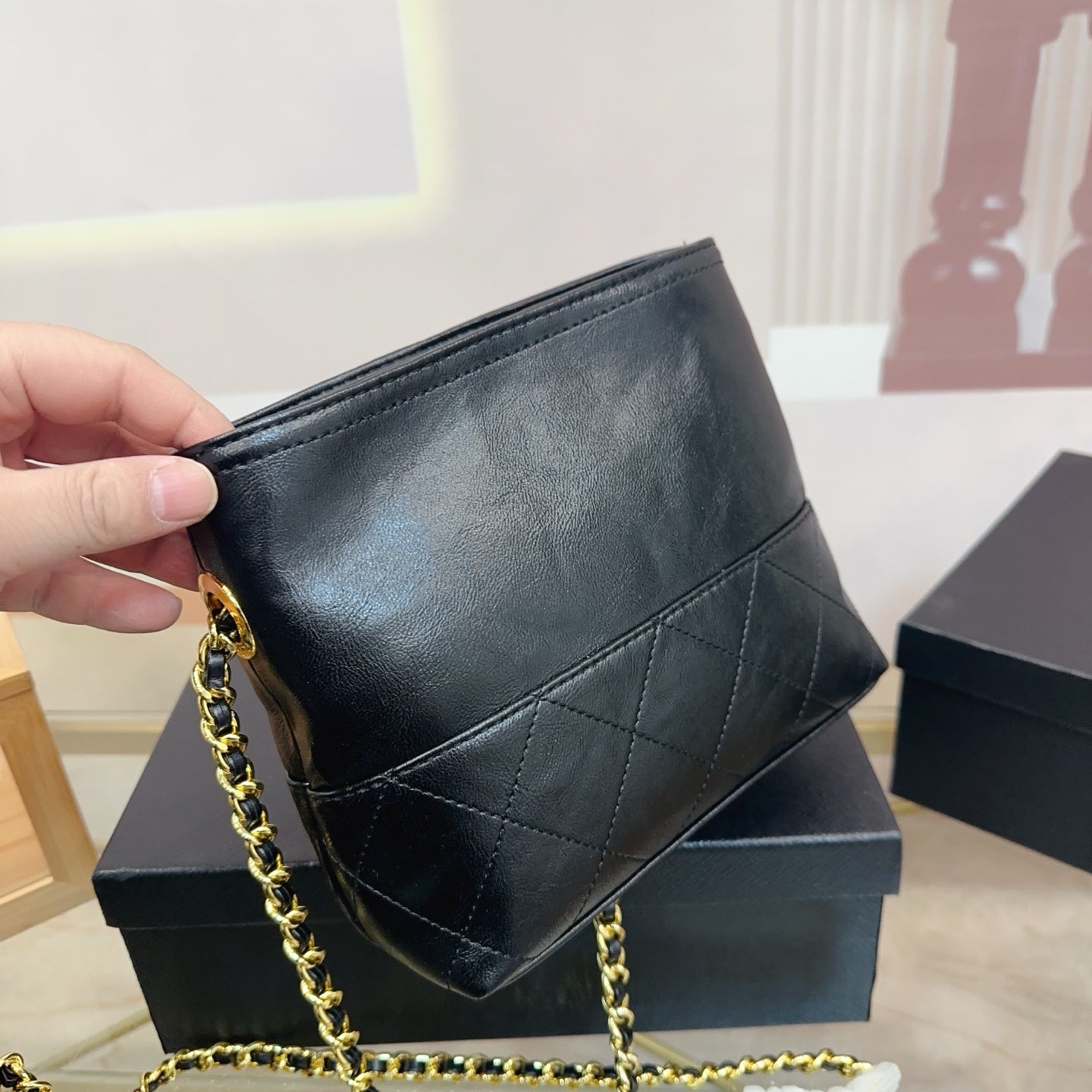 QUILTED CHAIN MINI HOBO BAG 19 IN SHINY BLACK CALFSKIN