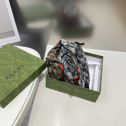 BOW HAIRBAND IN GRAY MONOGRAM CANVAS 414471