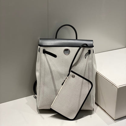 HERBAG A DOS ZIP RETOURNE BACKPACK 29 IN OFF-WHITE CANVAS AND BLACK CALFSKIN