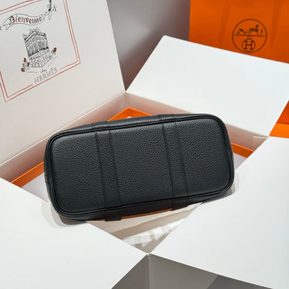 GARDEN PARTY 30CM IN ORANGE MINIMUM TOILETS COTTON CANVAS AND BLACK CALFSKIN