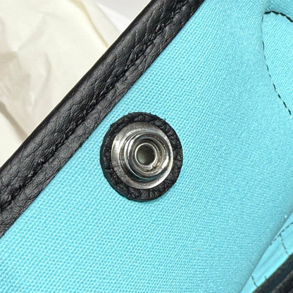 GARDEN PARTY 30CM IN WHITE TOILETS COTTON CANVAS AND BLACK CALFSKIN SKY BLUE CANVAS ON SIDE OTHER