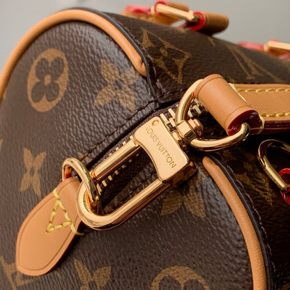 NANO SPEEDY DATING 18 IN BROWN COATED CANVAS GOLD HARDWARE