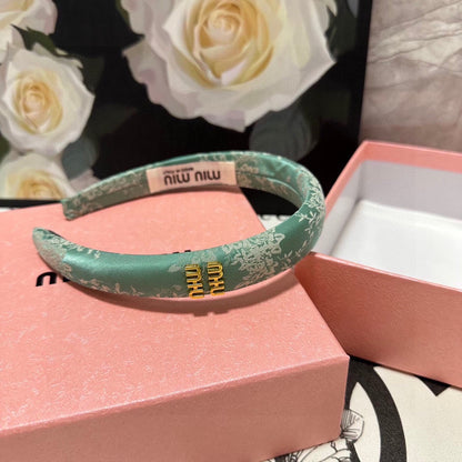 HEADBAND WITH GARNITURE PRINT IN VIRIDIAN GREEN SILK 432823