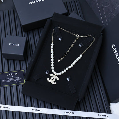 25P PEARL NECKLACE IN LIGHT GOLD STAR & HEART DOUBLE C PENDANT