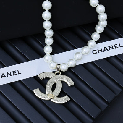 25P PEARL NECKLACE IN LIGHT GOLD STAR & HEART DOUBLE C PENDANT