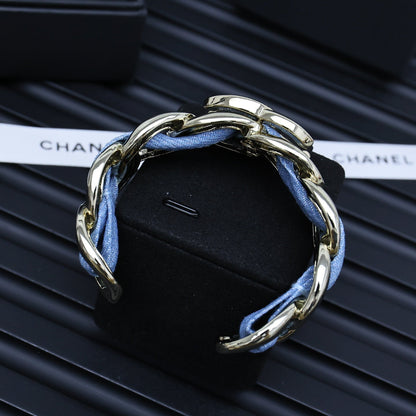 CC 25P IN DENIM-THREADED WIDE CHAIN GOLD METAL BRACELET