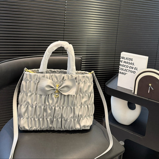 BOW DETAIL RUCHED TOP HANDLE BAG 29 IN LIGHT GREY SAFFIANO LEATHER