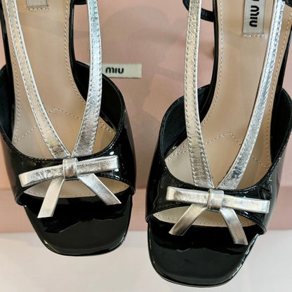Black High Heels With Silver Bow