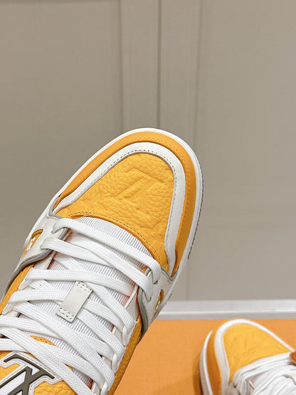 LV TRAINER SNEAKER IN SAFFRAN YELLOW GRAINED CALFSKIN