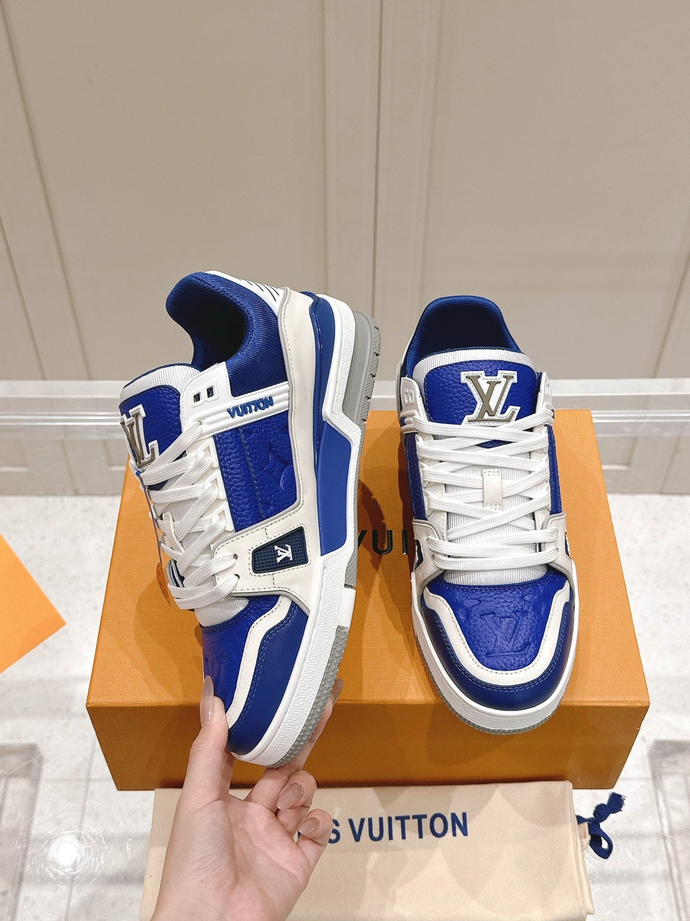 LV TRAINER SNEAKER IN GASTON BLUE GRAINED CALFSKIN