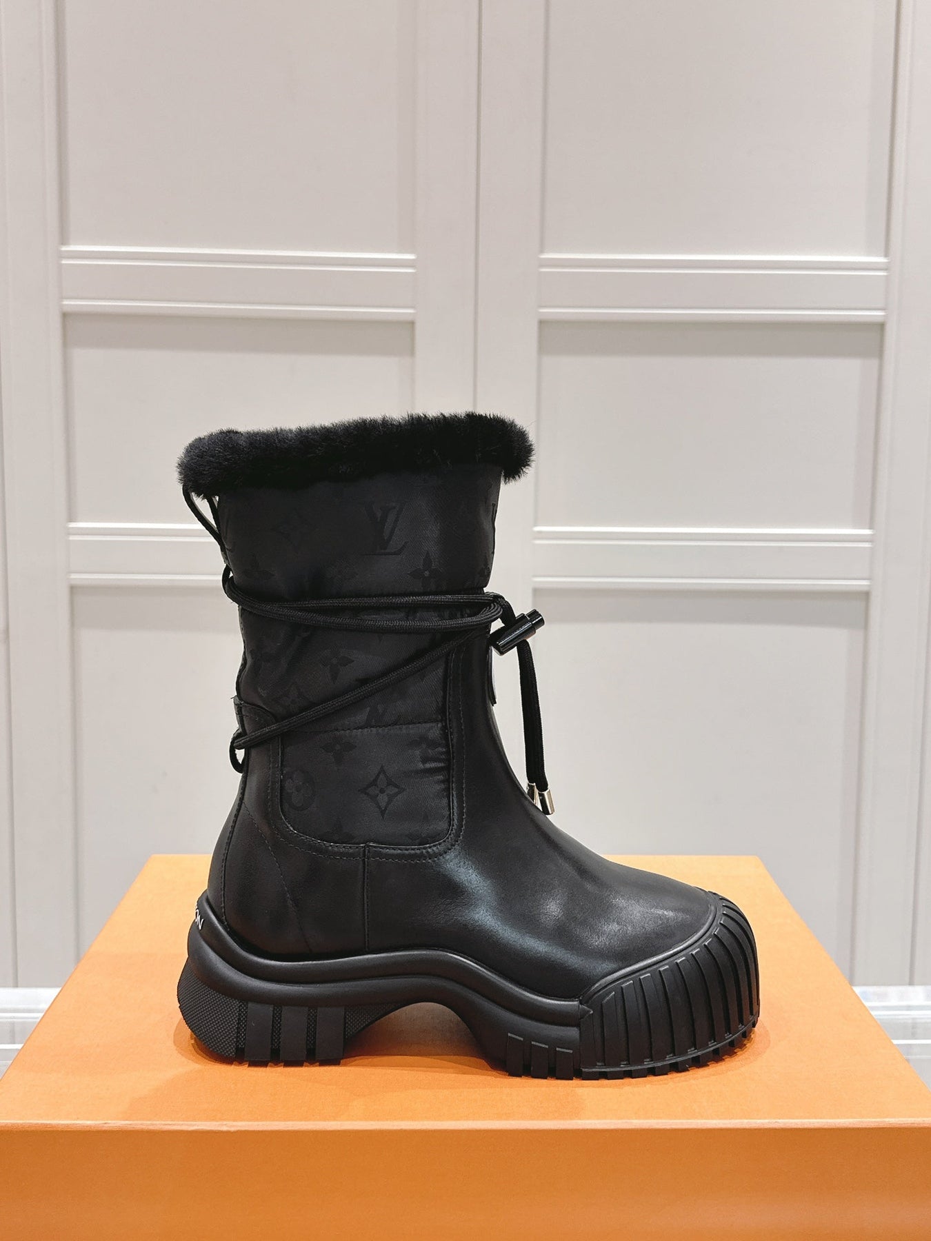RUBY FLAT ANKLE BOOT IN BLACK CALFSKIN AND MONOGRAM NYLON