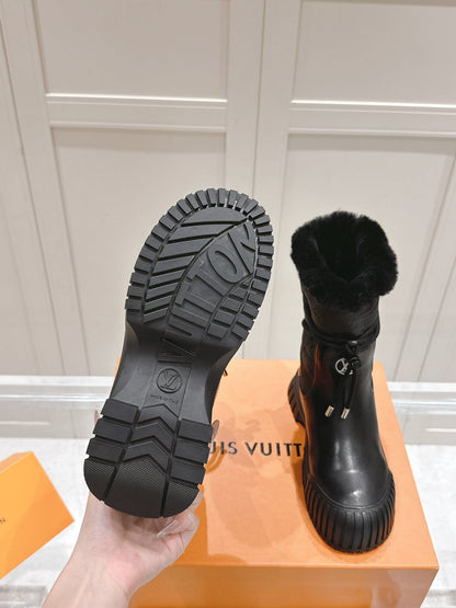 RUBY FLAT ANKLE BOOT IN BLACK CALFSKIN AND MONOGRAM NYLON