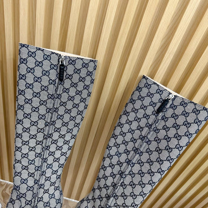 PLATFORM KNEE BOOTS IN LIGHT GRAY MONOGRAM CANVAS AND SHEEPSKIN LINING