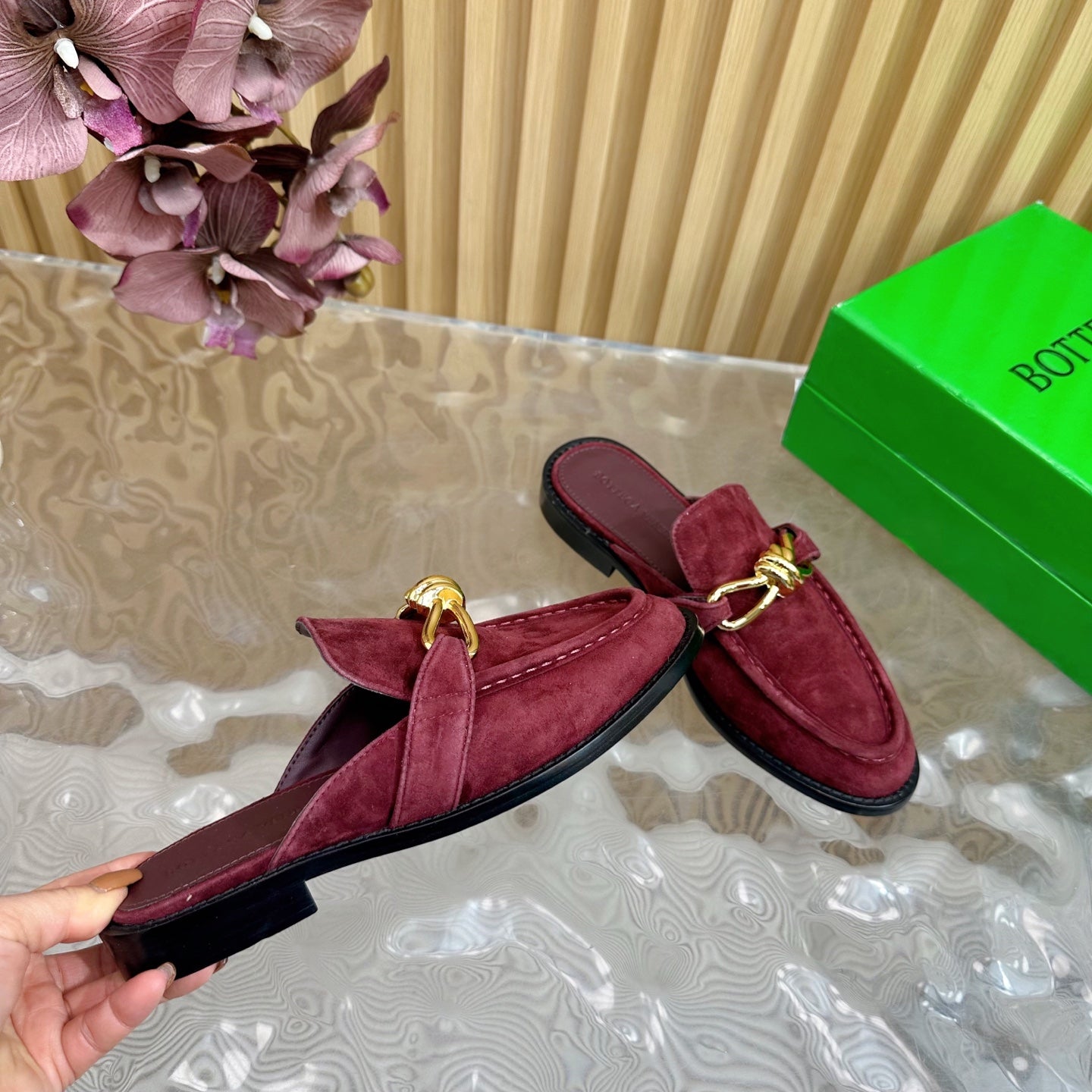 OPEN-BACK LOAFER REALISED IN GARNET RED SUEDE WITH SIGNATURE METALLIC KNOT DETAIL