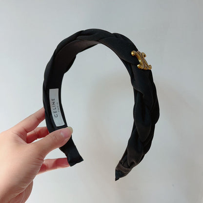 BLACK FABRIC HAIRBAND WITH GOLD LOGO 124699