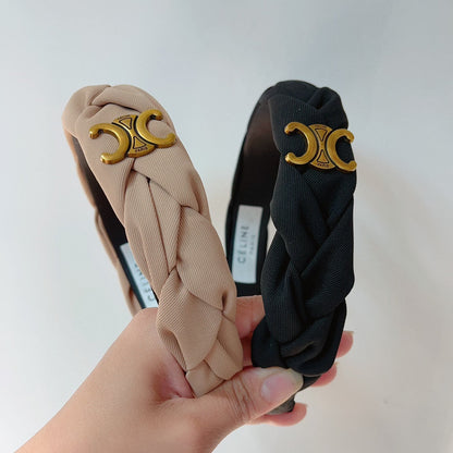 BLACK FABRIC HAIRBAND WITH GOLD LOGO 124699