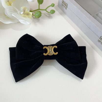 BLACK VELVET WITH GOLD LOGO HAIRPIN 387059