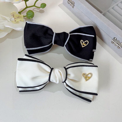 BOW HAIRPIN IN BLACK AND WHITE TRIM COTTON 406022