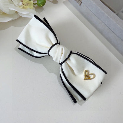 BOW HAIRPIN IN WHITE AND BLACK TRIM COTTON 406023