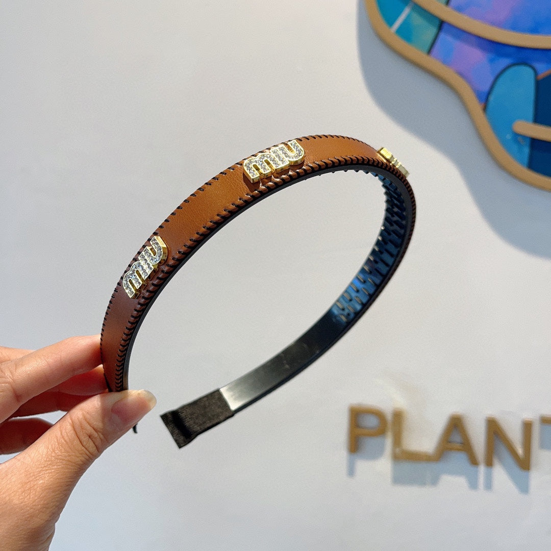 HEAD BAND IN BURNT ORANGE LAMBSKIN AND RESIN 417296