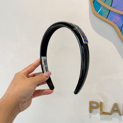 HEADBAND IN BLACK PATENT CALFSKIN SILVER LOGO 427344