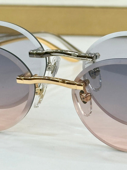 PANTHÈRE RIMLESS ROUND FRAME SUNGLASSES CT0504S IN METAL