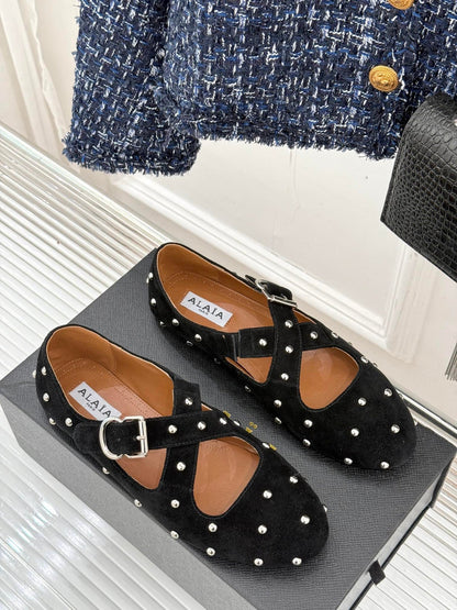 CROSSED STRAP BALLET FLATS IN BLACK SUEDE