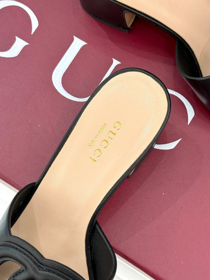 MID-HEEL MULE IN BLACK CALFSKIN