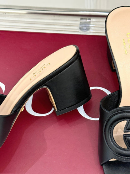 MID-HEEL MULE IN BLACK CALFSKIN