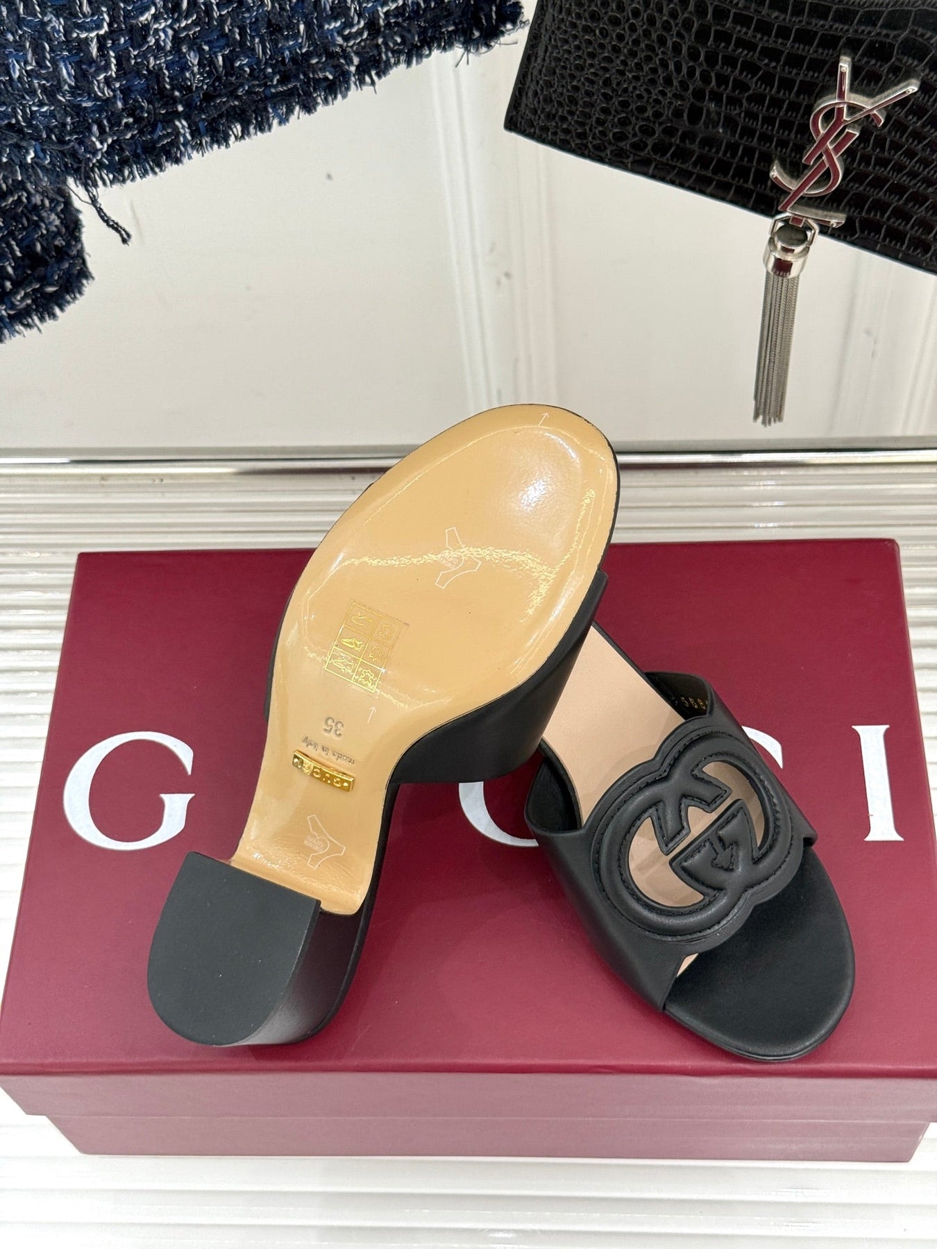 MID-HEEL MULE IN BLACK CALFSKIN