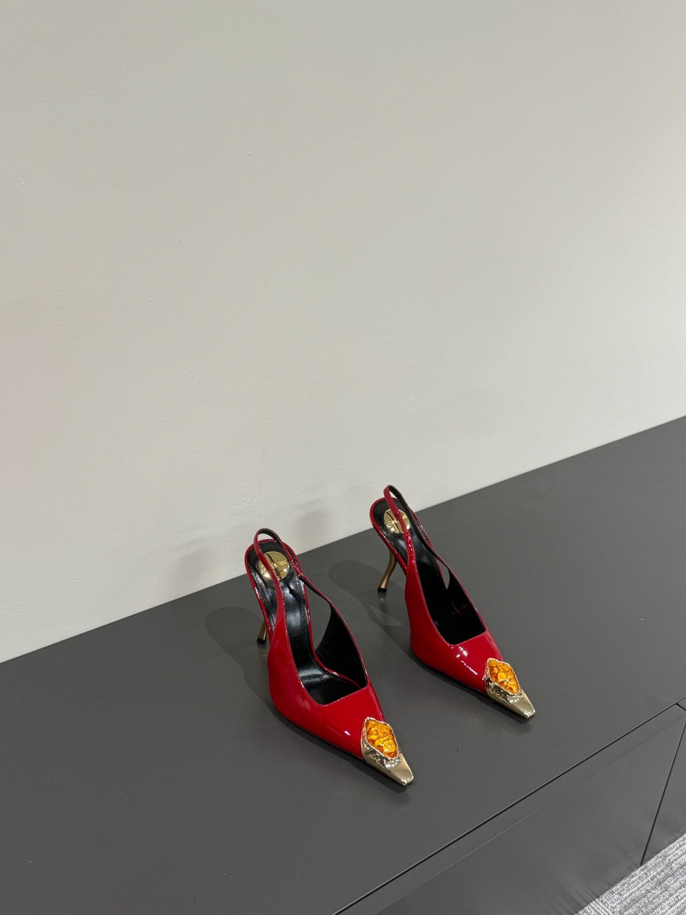 ORANGE GEM-STUDDED SLINGBACK PUMPS IN RED PATENT CALFSKIN